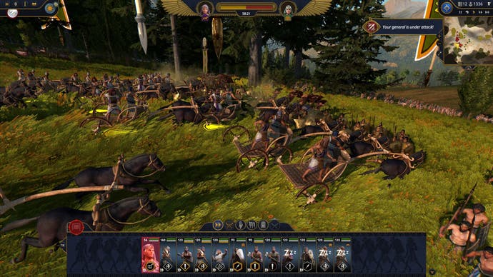 A unit of chariots charges towards the enemy in Total War: Pharaoh.