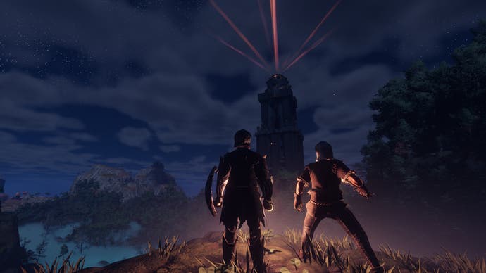 Enshrouded screenshot showing Two players holding torches stand in front of a dark tower at night, with red beams shooting out from the top.