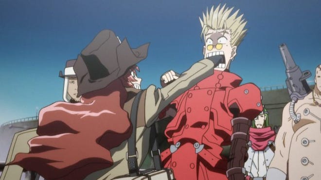 Still image of one character throwing a hand into another character's face