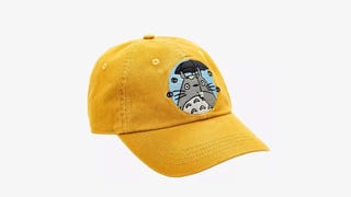 Photograph of yellow hat with Totoro on it
