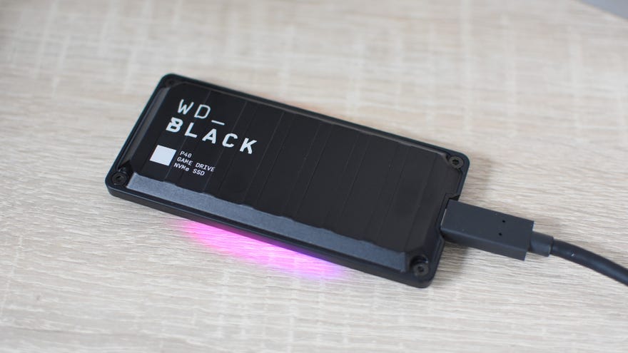 The WD Black P40 SSD, connected and with its RGB light strips glowing.