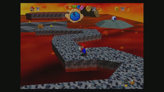 最佳马里奥游戏-超级马里奥64截图显示马里奥跑在鹅卵石的道路上通过熔岩。