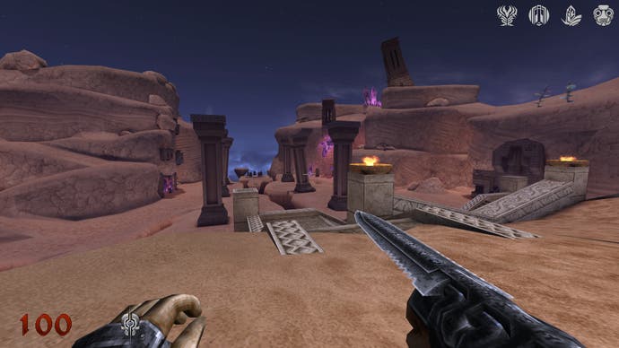 A screenshot from Wrath: Doom Eternal depicting a rugged desert landscape with a row of curved pillars running down the center.