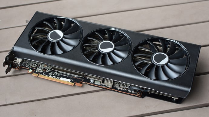 The XFX Speedster QICK 319 Radeon RX 7800 XT Core Edition graphics card on a table.