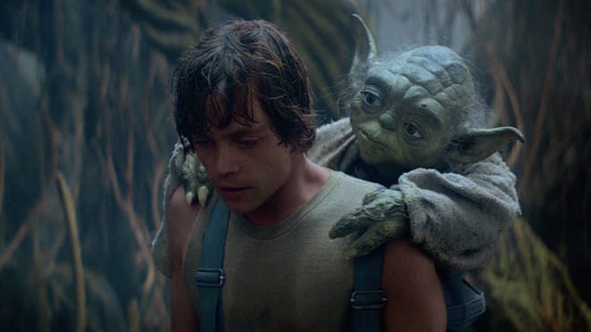 Luke and Yoda training on Dagobah