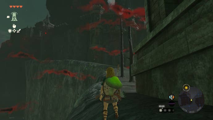 Link finds a path beside the Hyrule Castle gate in The Legend of Zelda: Tears of the Kingdom