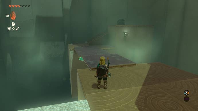 Link forms a bridge over to a chest using two sheets of metal in the Ren-Iz Shrine in The Legend of Zelda: Tears of the Kingdom
