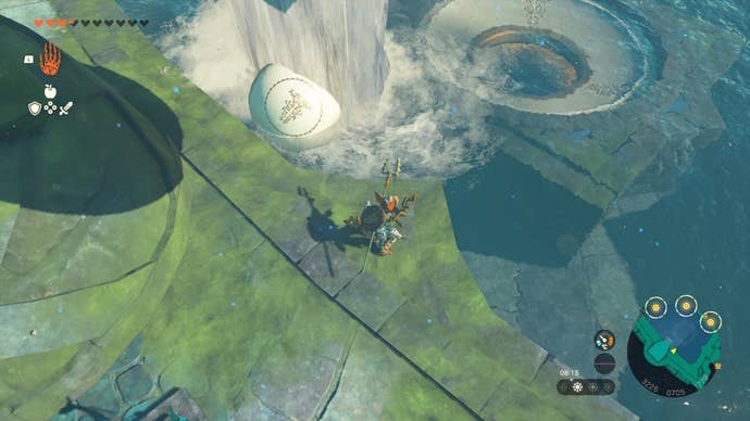 Link looks at a ball and a hole in some water in The Legend of Zelda: Tears of the Kingdom