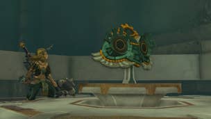 Link sits beside a Zonai Relic in The Legend of Zelda: Tears of the Kingdom