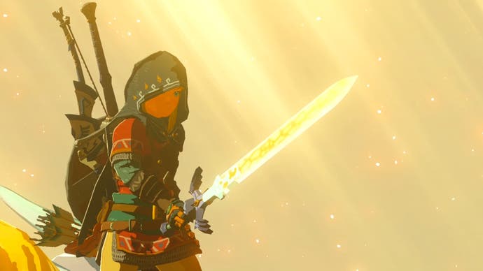 Link holding the Master Sword away from his body. The weapon glows brightly as light basks the character and the sword.