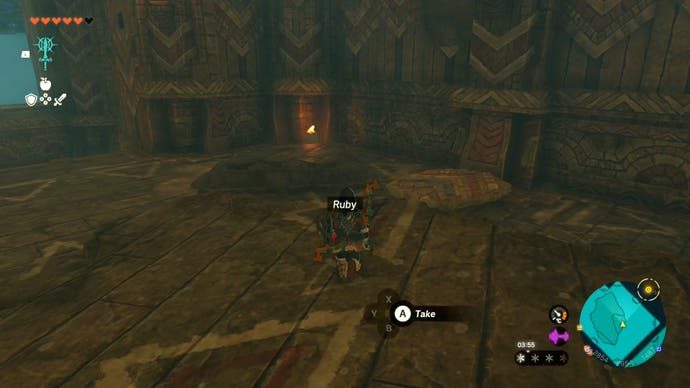 Link picking up a Ruby in the Wind Temple in The Legend of Zelda: Tears of the Kingdom.