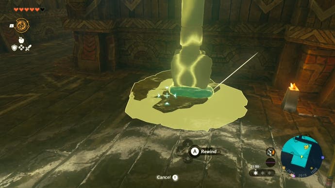 Link using his Recall ability in the Wind Temple to rewind spinning a cog.