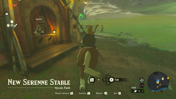Link riding around a stable in Hyrule in The Legend  of Zelda: Tears of the Kingdom.