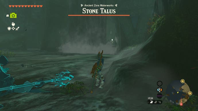 Link fighting a Stone Talus enemy at the Ancient Zora Waterworks.