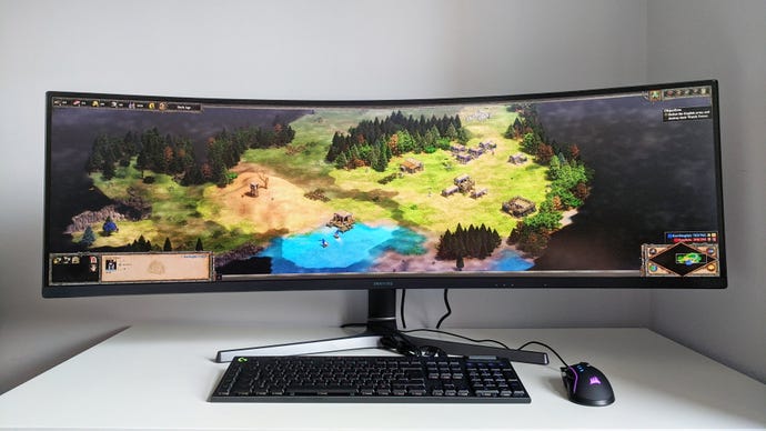 A photo of an ultrawide gaming monitor running Age Of Empires II: Definitive Edition