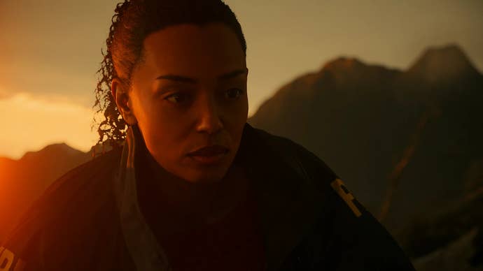 Saga Anderson, of Alan Wake 2, looks perturbed in the setting sun of a mountain township.