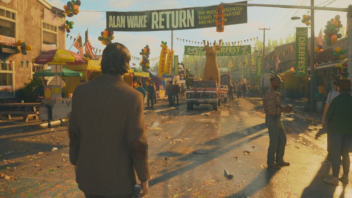 A screenshot from Alan Wake 2 showing Alan Wake walking into the celebrations at Deerfest with a banner dedicated to his book hanging above the street