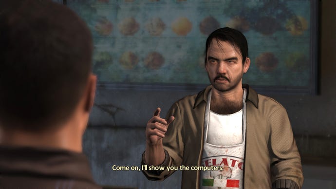 Talking about computers in an Alpha Protocol screenshot.