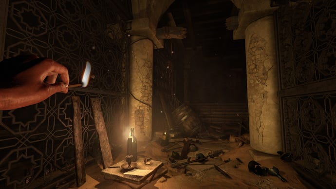 A dark and ruined room illuminated by matchlight in an Amnesia: Rebirth screenshot.