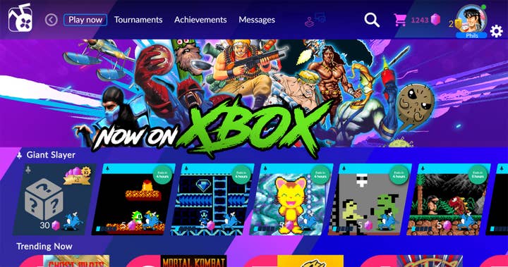 An image of the Antstream main page with a "Now on Xbox" graphic collage of some of the games offered and two rows of games to play, one titled "Giant Slayer" and the other "Trending Now"