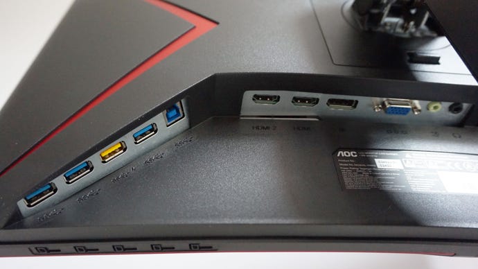 A photo of the AOC C24G2U gaming monitor's display inputs and USB hub