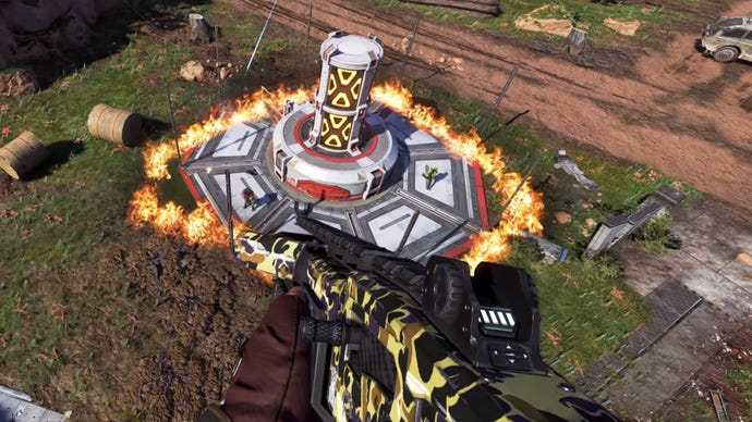 An Apex Legends screenshot of Fuse flying down towards a ring of fire created by his Ultimate ability.