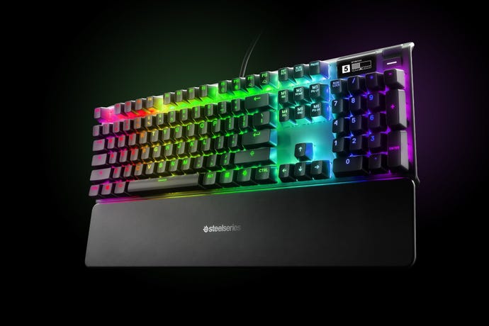 a photo of a beautiful RGB gaming peripheral, specifically an Apex Pro keyboard