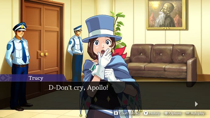 Captura de pantalla de Apollo Justice Trilogy que muestra a un personaje con un sombrero de copa que dice "¡No llores, Apolo!"