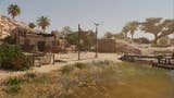 Assassin's Creed Mirage, landscape shot of fishing huts, nets, and hanging fish on the bank of  a River.