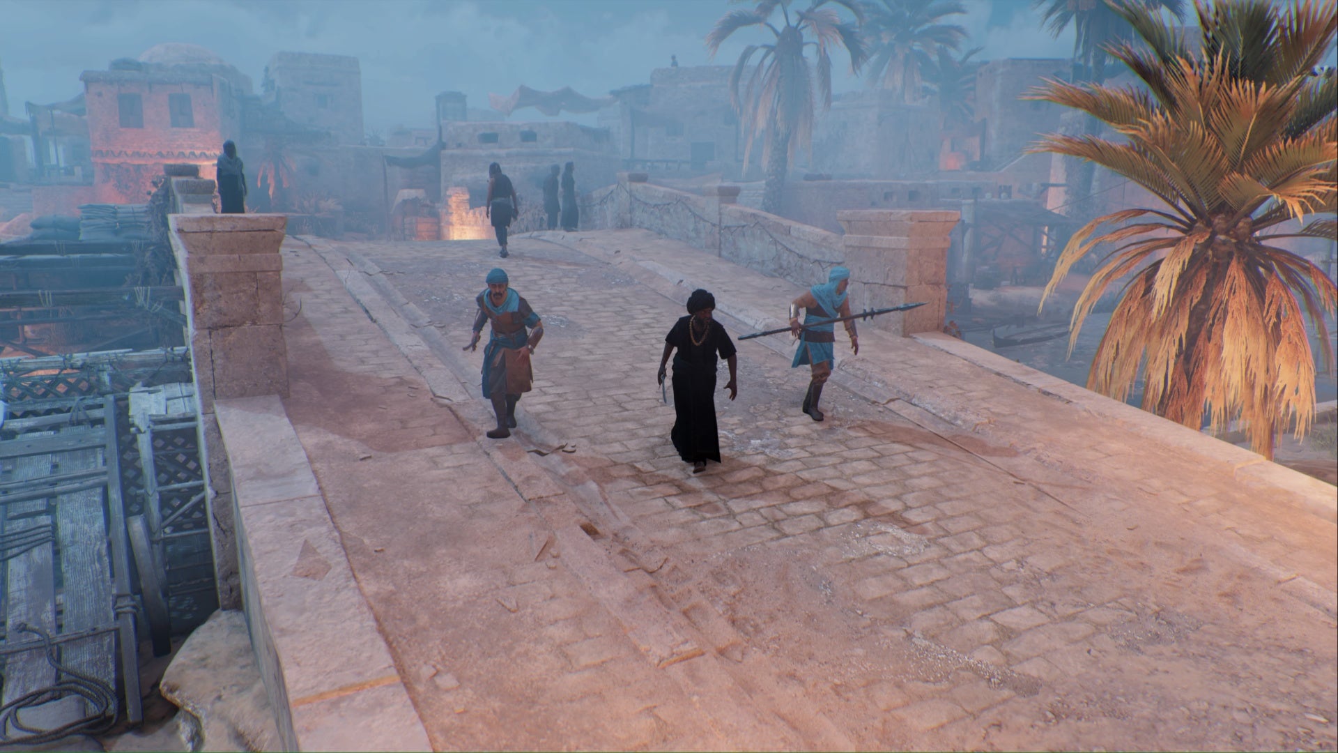Assassins Creed Mirage A Tha'abeen y dos guardias cruzan un puente en Anbar