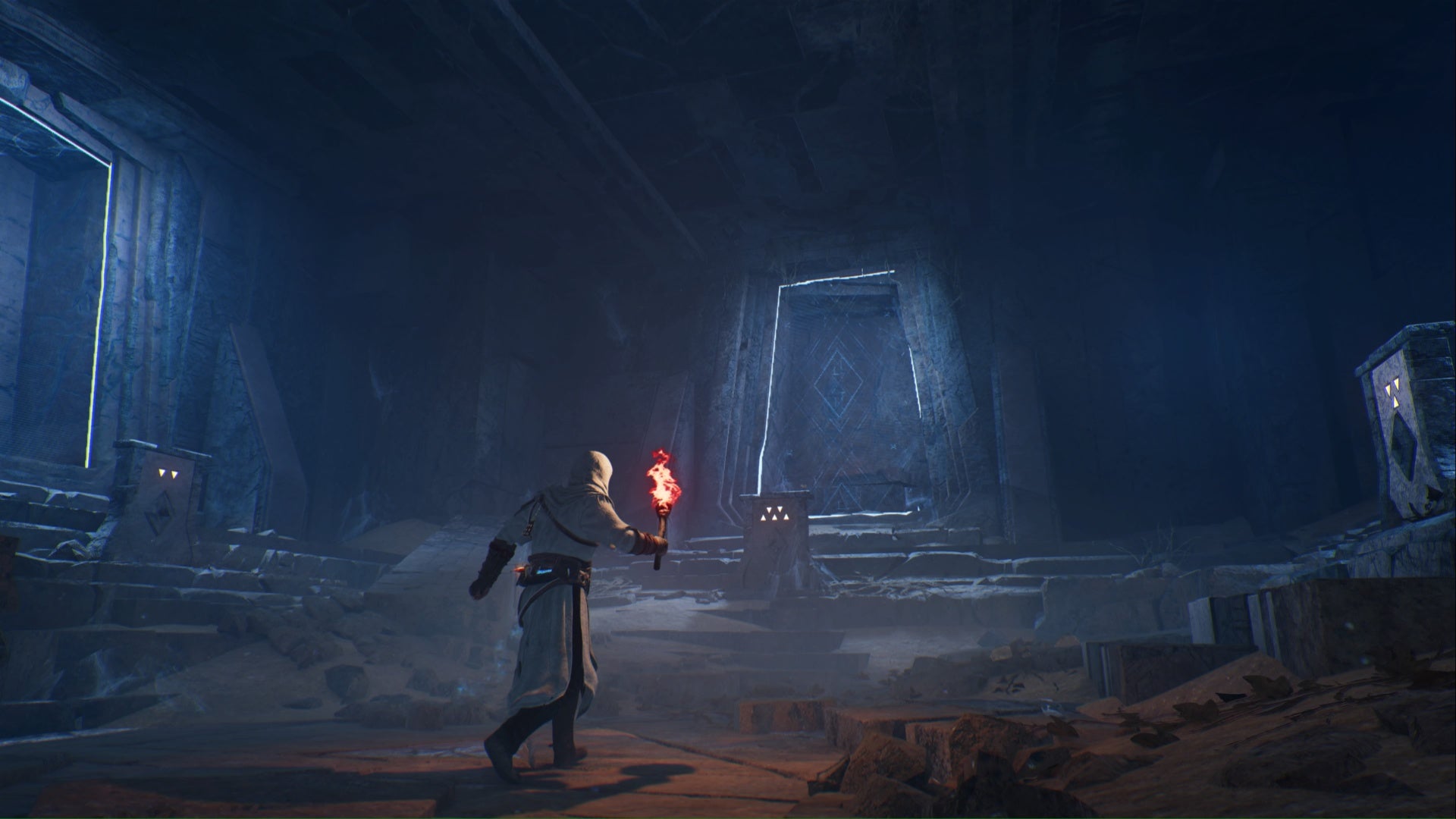 Assassins Creed Mirage Basim sosteniendo una antorcha en una cámara subterránea secreta