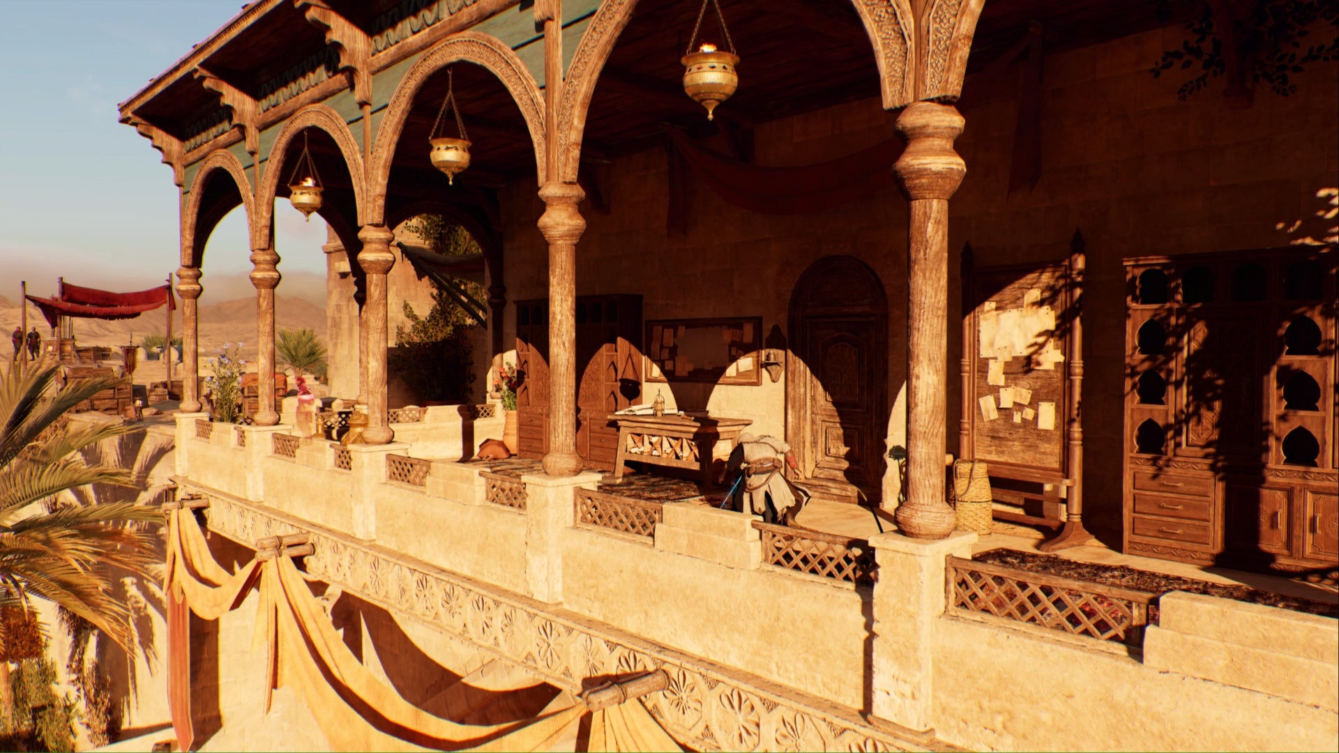 Assassins Creed Mirage, Basim está agachado cerca de una mesa en el balcón de la puerta de Basora.