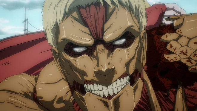 Image from the Attack on Titan anime showing a close-up of the huge, hulking Armored Titan looking menacing.