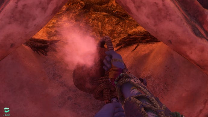 Screenshot of a Na'vi preparing food in Avatar: Frontiers Of Pandora