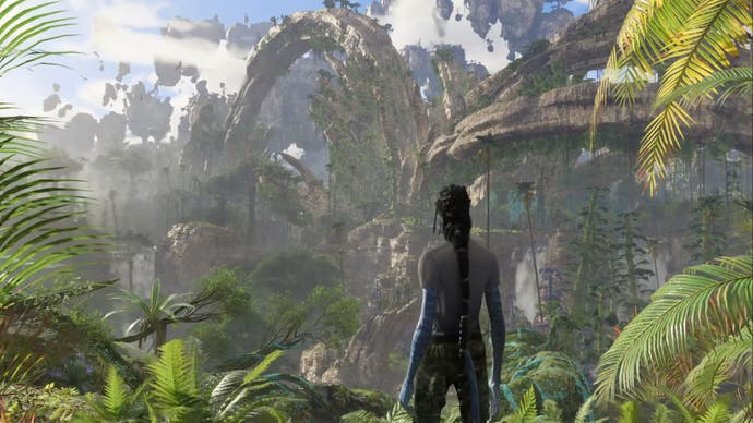 Pandora Na'vi avatar borders in human clothing looking at the jungle