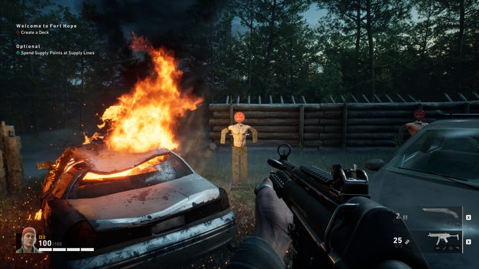 A target dummy next to a burning car in Back 4 Blood.