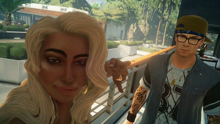 Agent 47, from Hitman, is disguised as a famous tattoo artist, with cap backwards and fake tattoos on his arms. He is in a selfie with a blonde woman throwing up the Shaka sign with her free hand