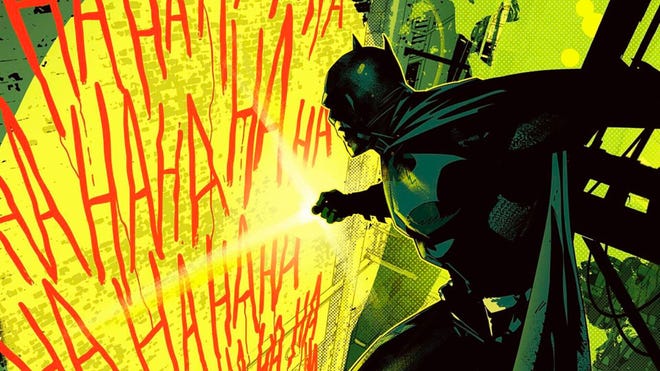 Batman examines Joker graffiti