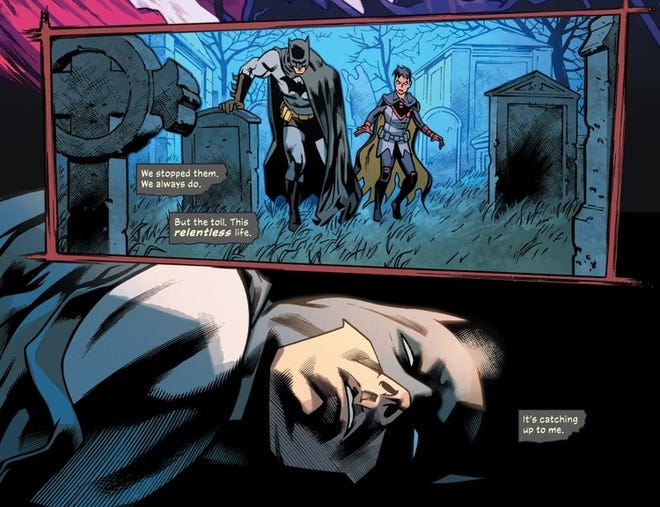 Batman is exhausted in a graveyard