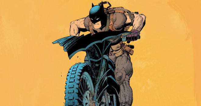 Batman rides a makeshift Bat-Cycle