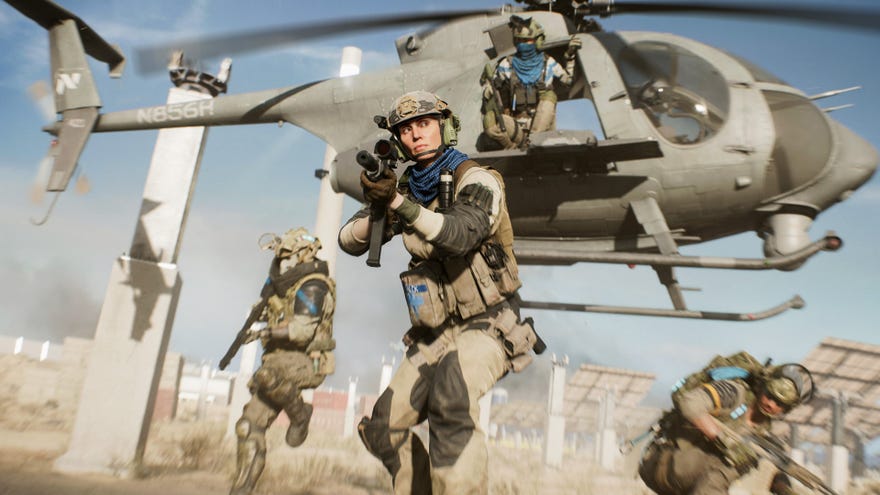 A helicopter deploys soldiers onto a desert Hazard Zone in Battlefield 2042.