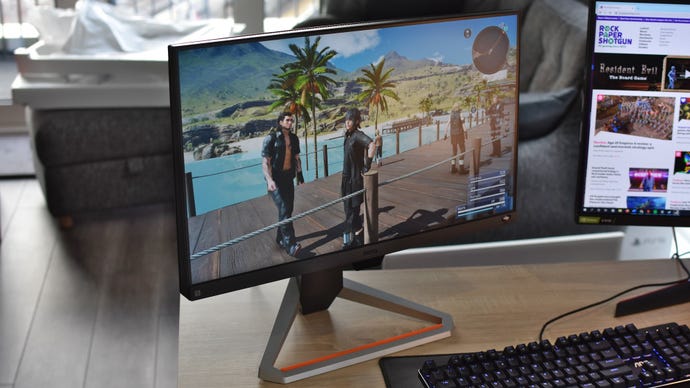 The BenQ Mobiuz EX2510S gaming monitor on a desk.