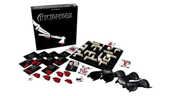 Nyctophobia board game box, pieces, and black out glasses