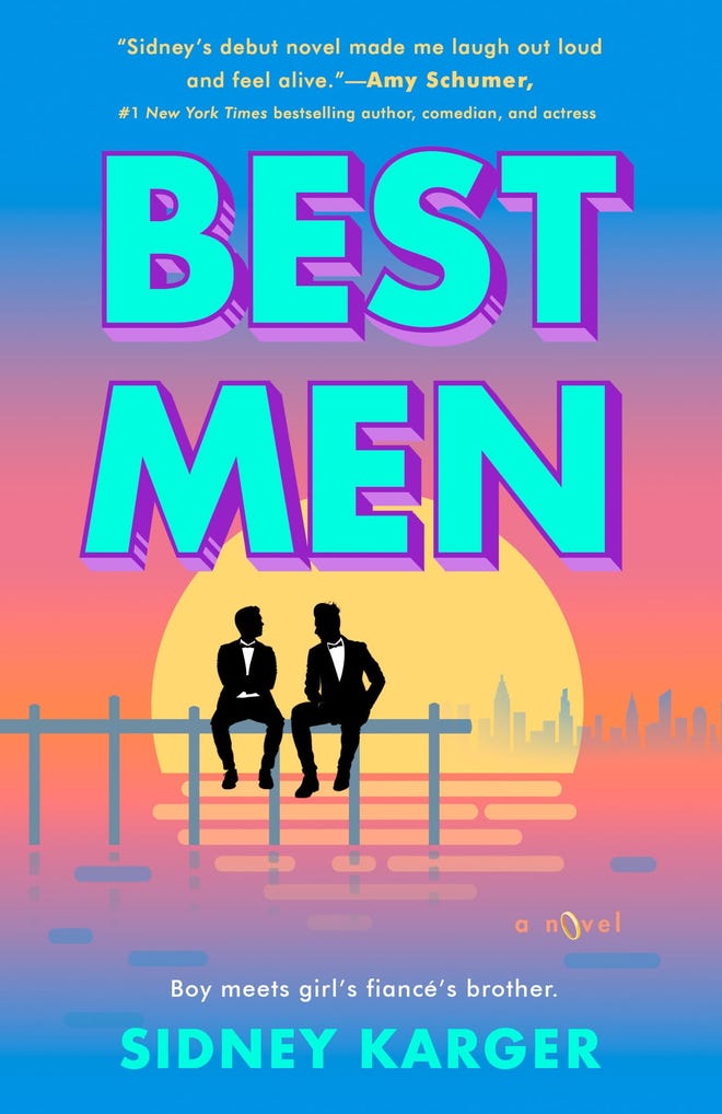 Blue cover of Best Men featuring two men in tuxes sitting on a pier at sunset