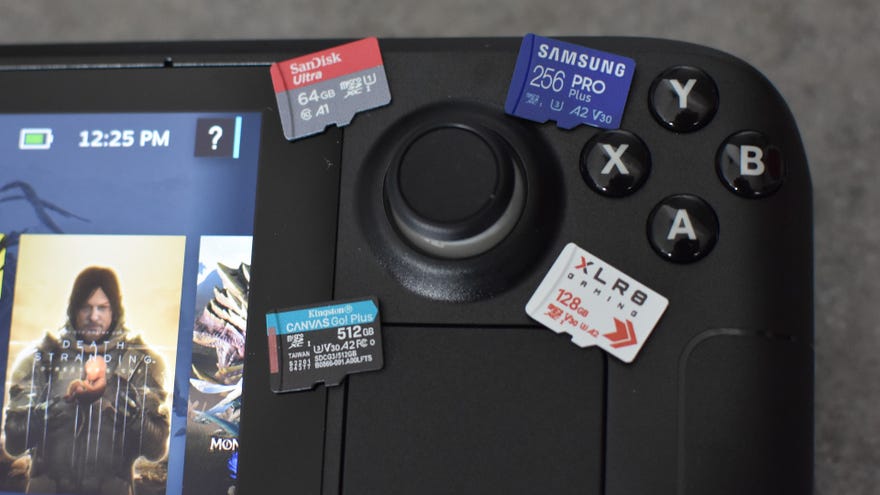 Four of the best microSD cards for the Steam Deck sitting on top of the device.