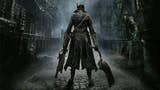 The famous Bloodborne promotional image of our hunter facing away from us with expandable cleaver in one hand, blunderbuss-style shotgun in the other, and a long travelling cloak on. The hunter faces a dark and misty city.