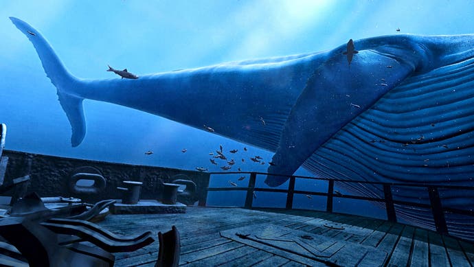 The tail-end of a huge blue whale, as seen from the wreckage of a ship underwater. It's a VR demo.