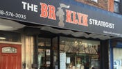 Storefront of The Brooklyn Strategist board game cafe in New York City
