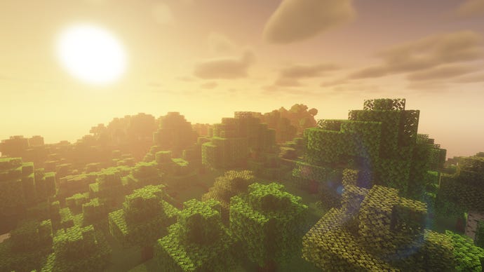 A sunrise over a forest in Minecraft.