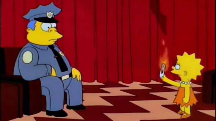 Lisa Simpson holds out a burning playing card to Chief Wiggum in a not-so-subtle parody of Twin Peaks.
